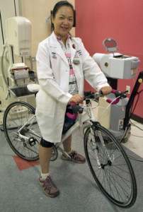 Ishiuan with her bike at work.